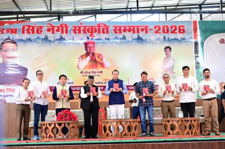 Chief Minister Dhami Releases Book on English Translation of Folk Singer Narendra Singh Negi’s Songs.